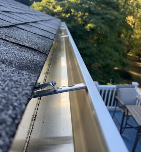 Clean gutter viewed from the roof looking down the gutter